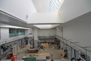 A woodshop at the Logan Center visible from the main corridor